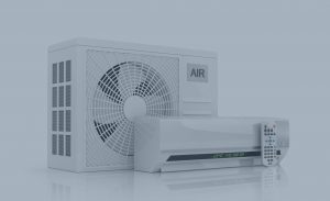 A white air conditioning unit with a visible fan and a digital display showing 24°C, accompanied by a remote control, set against a light blue background
