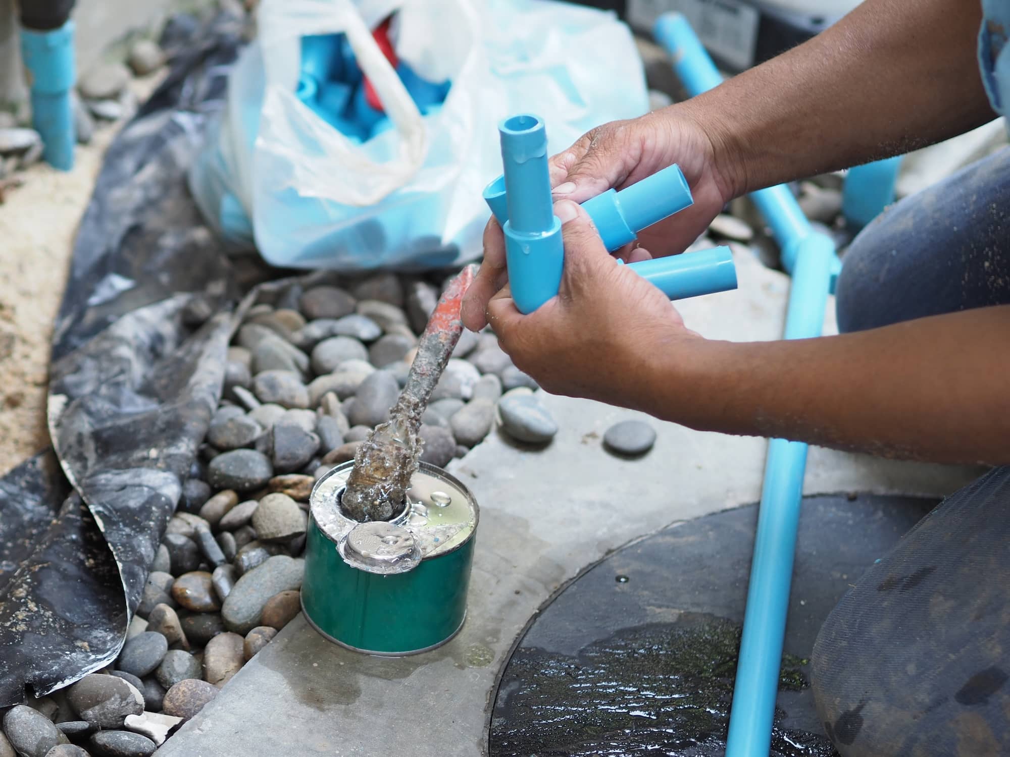 Broken water pipe blue color underground in the house in Burnaby, BC